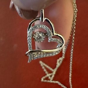 10k white gold diamond heart necklace.